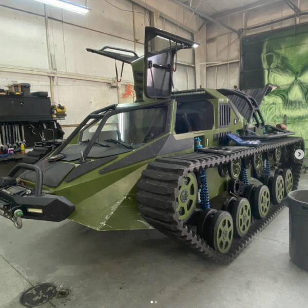 Armored all-terrain vehicle in garage